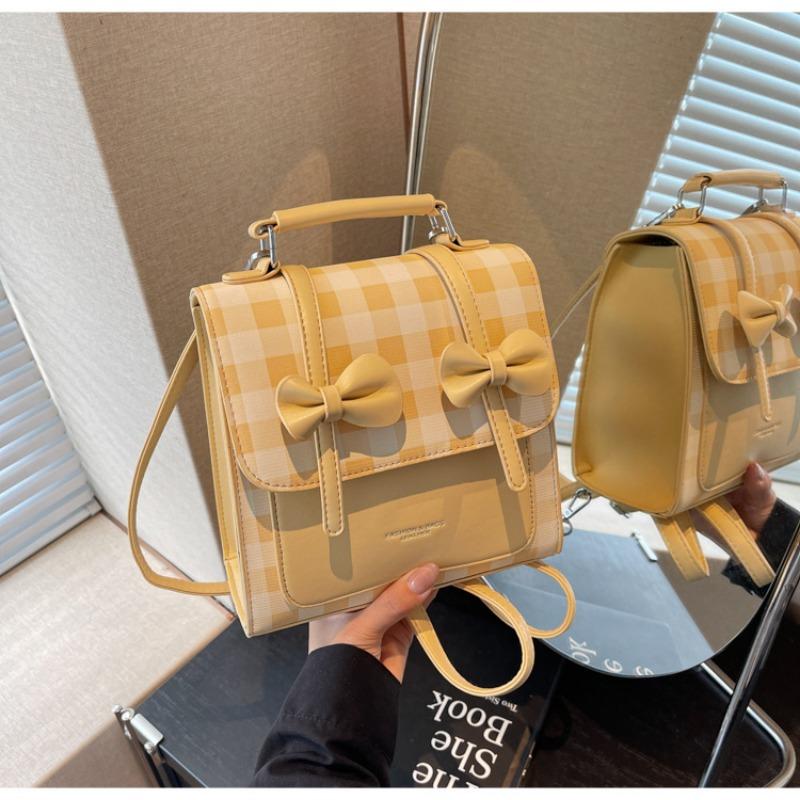 

Solid color college style commuter backpack women s new trend bow portable shoulder messenger bag