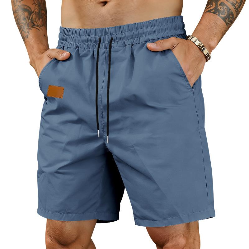 

Summer solid-color men s quick-drying loose casual simple beach shorts XXXL синій
