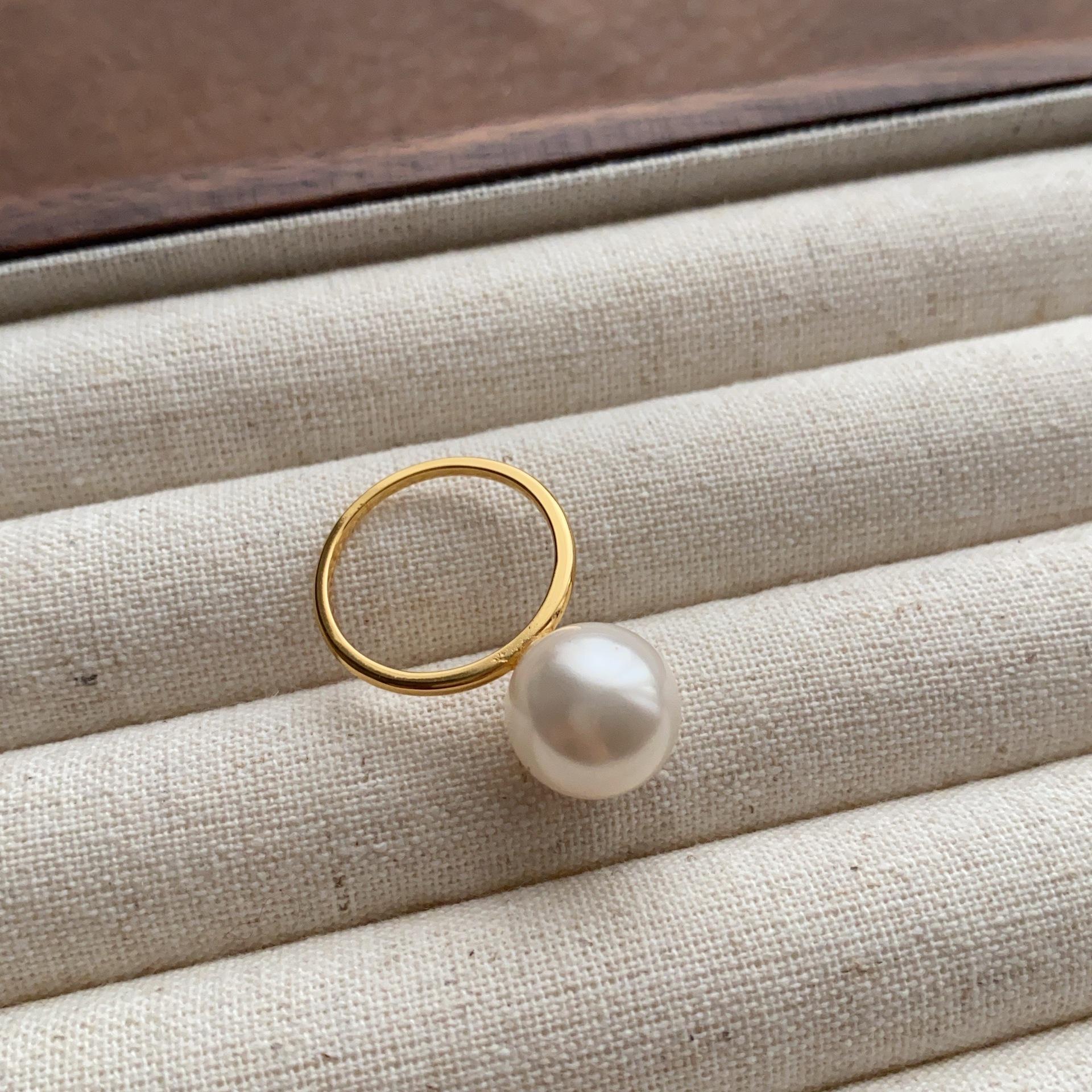 

Fashion pearl metal high-end ring versatile flexible niche design cold ring couple single index finger ring