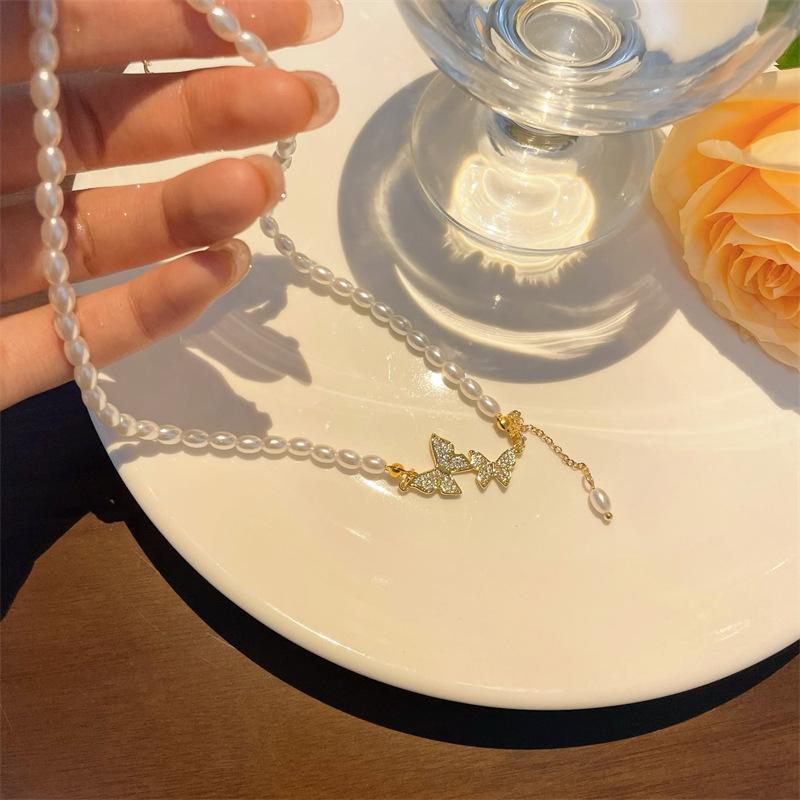 Colier de perle cu ciucuri fluture din argint S925 pentru Instagram pentru femei, nișă franceză, stil de lux ușor, baroc, lanț de clavicula cu cereale de orez