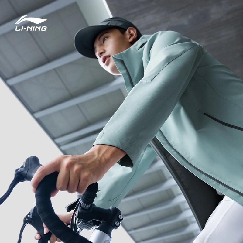 Li Ning Fitness Series Einfarbige Reflektierende Sportjacke mit Kapuze Herrenjacken Grau AFDT843-3