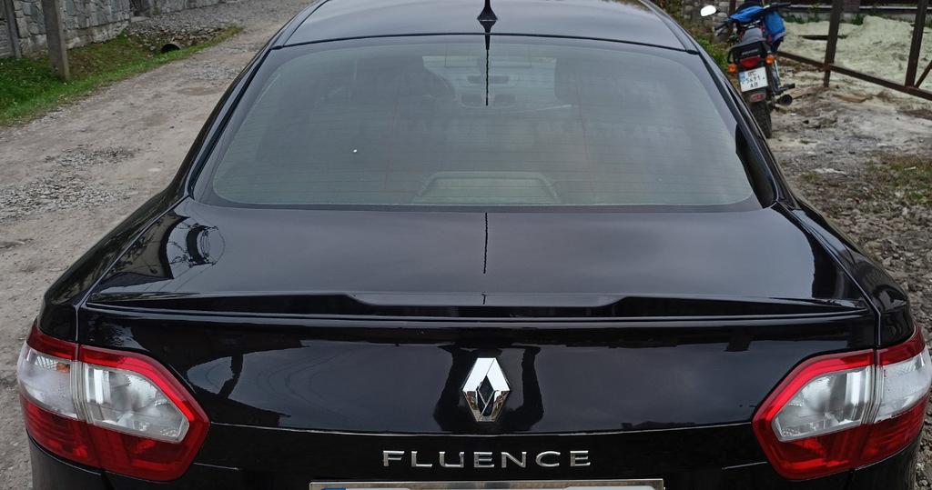 

Спойлер LIP (Sunplex, чорний) (125,4см*7,2см) для Renault Fluence 2009-2016 рр.