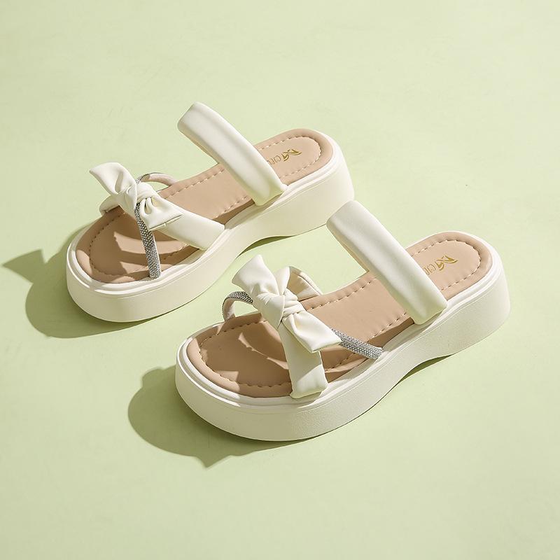 688-10 Two women in cool slippers 2025 new summer fairy wind flat bottom one-word drag Roman beach sandals