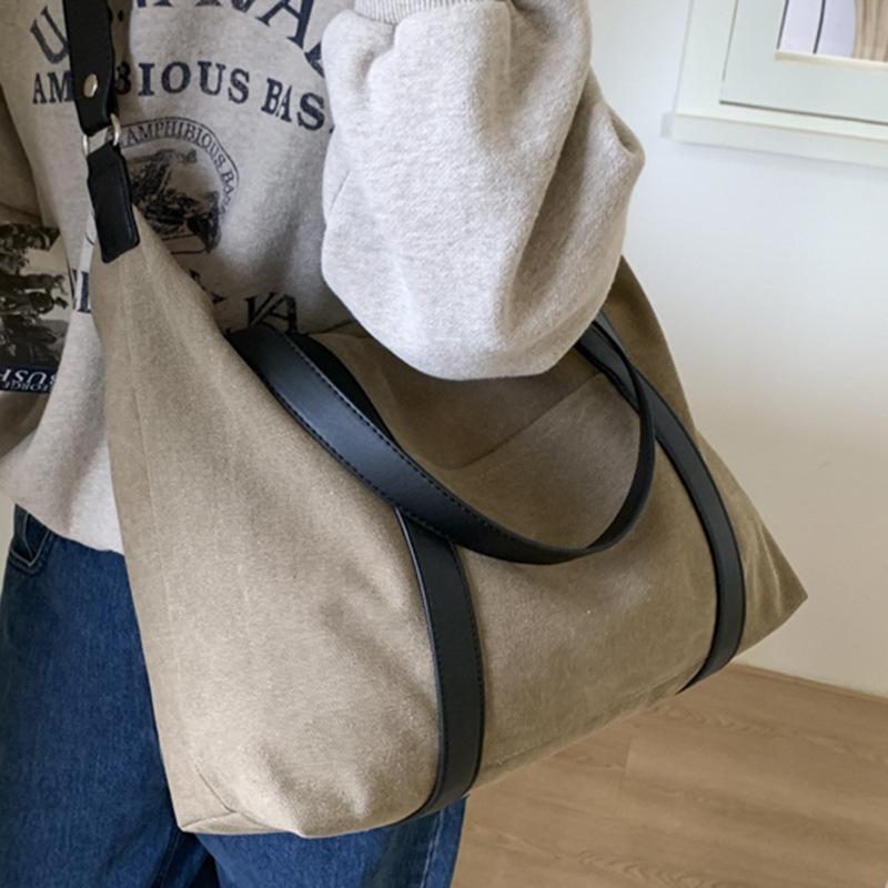 Lazy portable large-capacity canvas bag 2025 new tote bag niche casual retro commuter shoulder big bag women