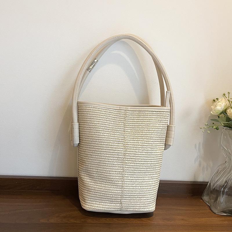 Stylish and Simple Woven Portable Bucket Bag Women's Autumn and Winter New High-end Seaside Vacation Shoulder Bag
