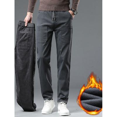 Zimowe spodnie casualowe pluszowe grube/regularne męskie elastyczny pas luźne wielokieszeniowe odzież robocza ciepłe spodnie sześciokieszeniowe spodnie męskie