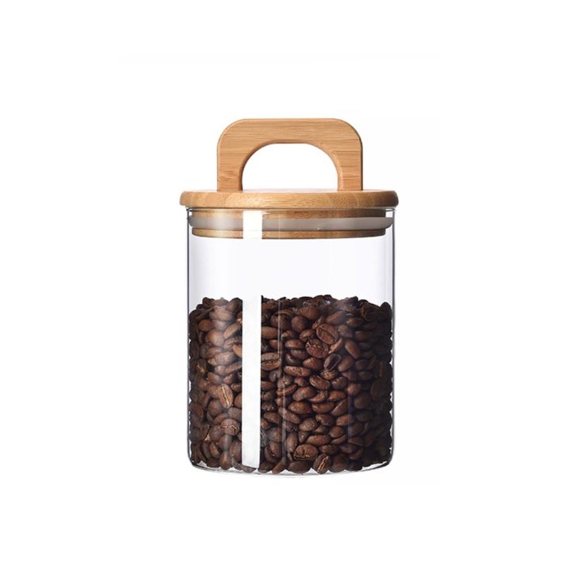 

Vacuum Sealed Clear Glass Dry Foods Canister Sealing Lid and Wood Handle Canister for Snacks and Ingredients