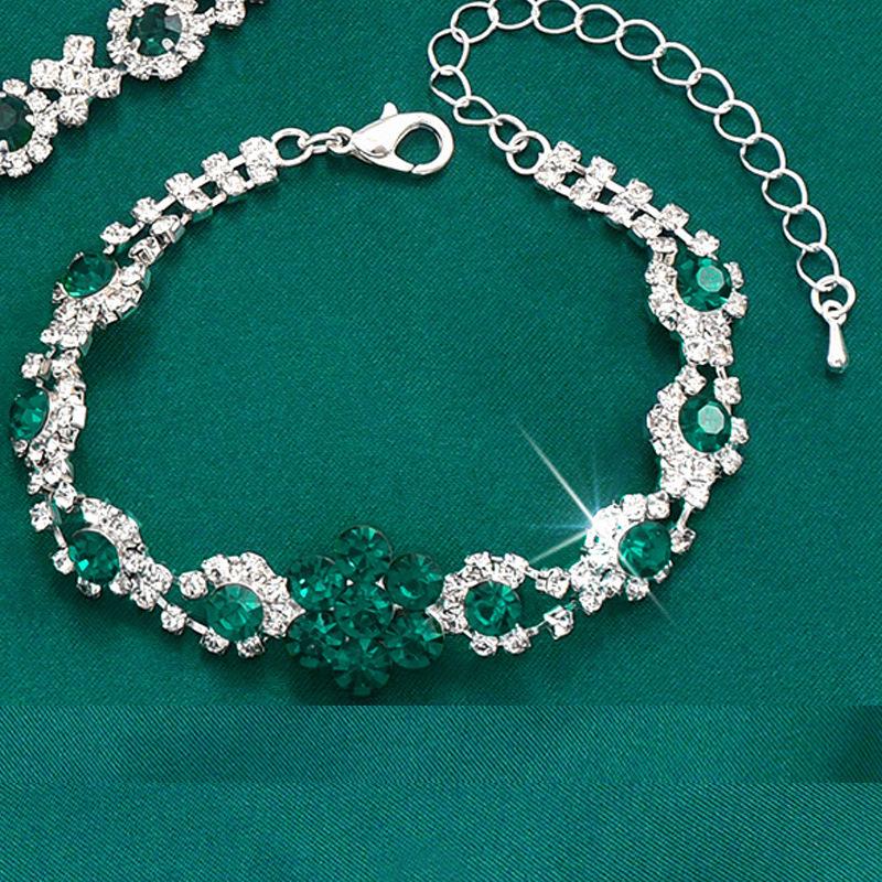 

2025 Высококлассный европейский и американский модный ювелирный набор с кристаллами и драгоценными камнями: Ожерелье, Серьги, Браслет, Кольцо.