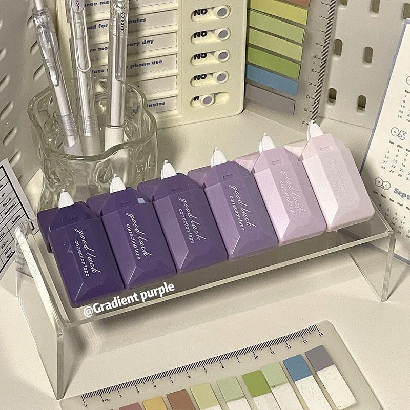 Gradient Series Erasable Correction Tape: High capacity, strong coverage in purple, blue, green, red, and pink with silent operation.