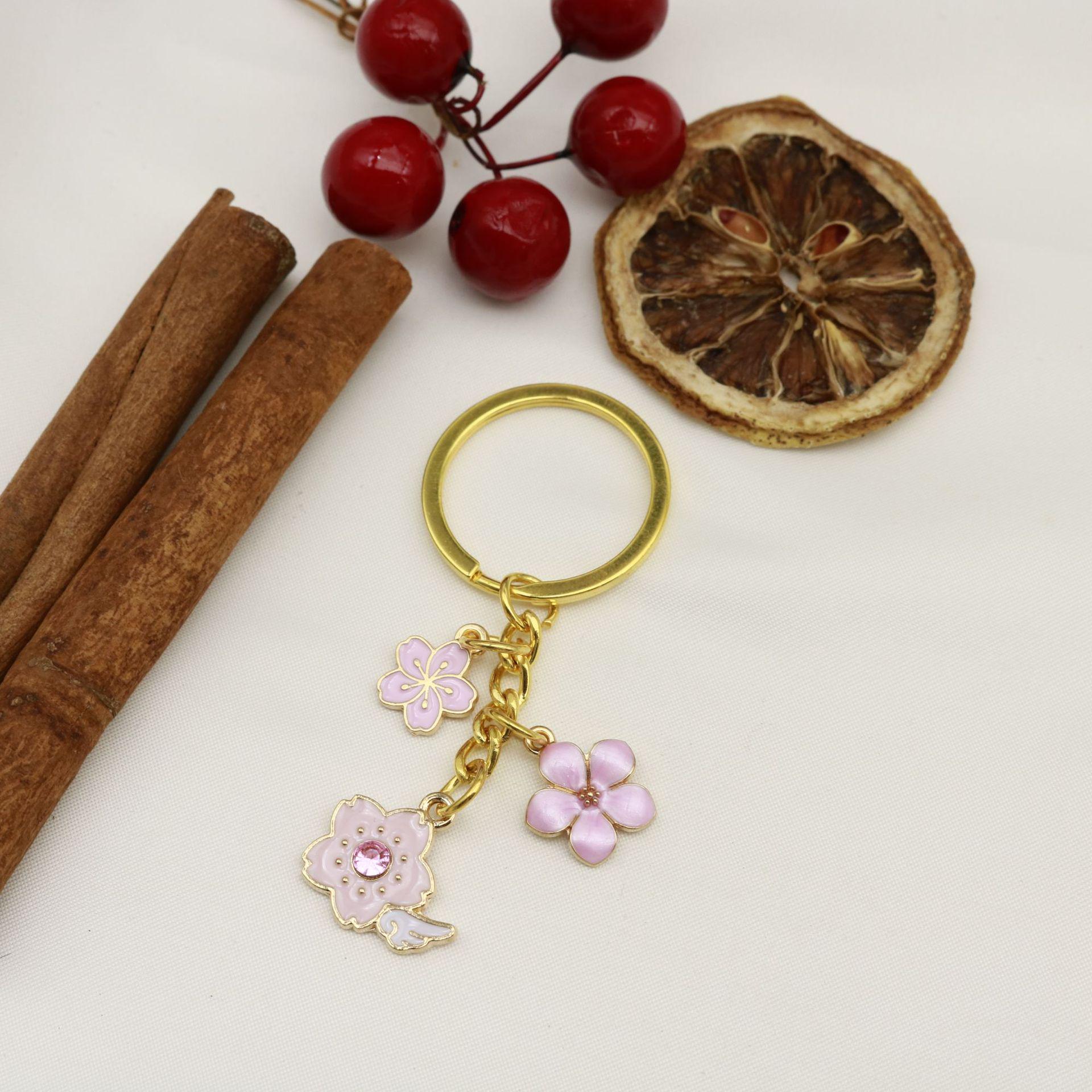 Pink Drip Oil Sweet Cherry Blossom Keychain Pendant for Bags and Boxes золотой