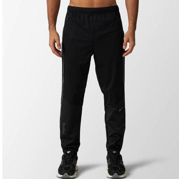 Nike X Nocta Elastické Reflexní Joggers se Stahovací Šňůrkou FW23 Unisex Spodní Díl Černá DV3733-010