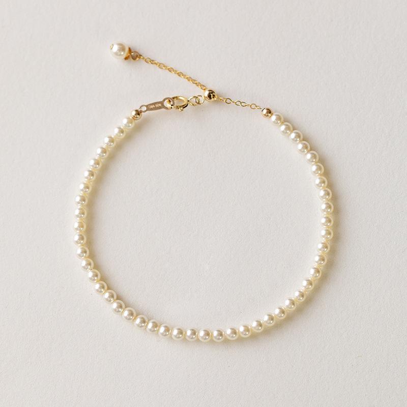 

Wearing gold beads and hanging pendants, pearl fine bracelets, layered wear, niche design, socialite light luxury style, light luxury design layered Shi Jia3mm Crystal Treasu