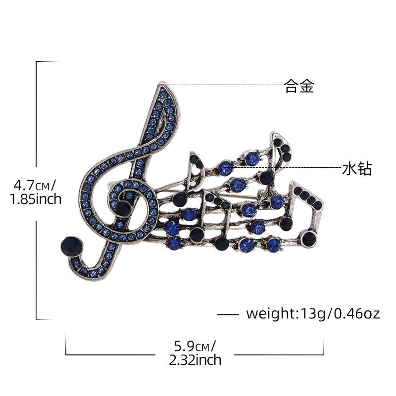 Spring and summer new alloy diamond music symbol brooch femininity high sense fashion music note clothing corsage