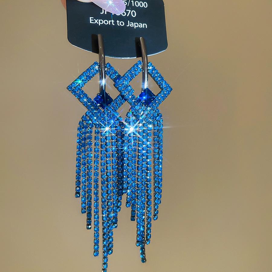 Silver Needle Water Drop Tassel Earrings - Light Luxury High-End Design for Women's Fashion.