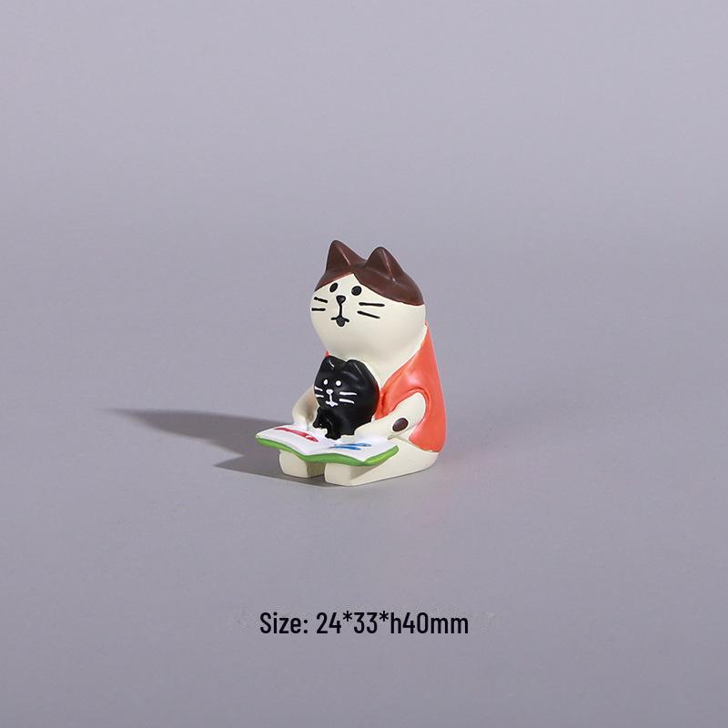 

Чарівна жаба читає на кріслі-гойдалці: Прикраса для декомпресії столу та автомобільний подарунок