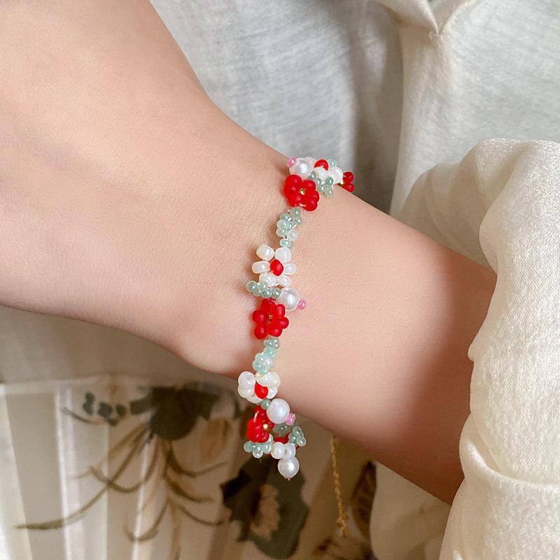 Small fresh flower rice bead pearl bracelet female sweet girl heart bracelet niche simple high-end jewelry
