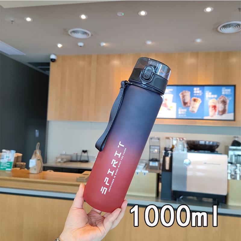 High-Capacity Gradient Sports Water Bottle with Straw - Portable and Durable for Outdoor Use