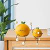 Niedliche Frucht Langbeinpuppen Mini Kreative Skulptur Orange Harzstatue Armaturenbrett Auto Desktop Garten Lustige Harzdekoration