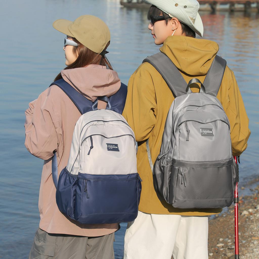 Schoolbag Men's trendy brand wear-resistant casual backpack large capacity junior high school student weight loss spine bag high school student Korean