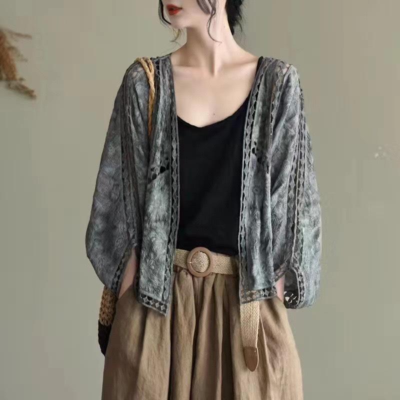 Evropský a americký letní krajkový háčkovaný kardigan dámská plážová bunda proti slunci