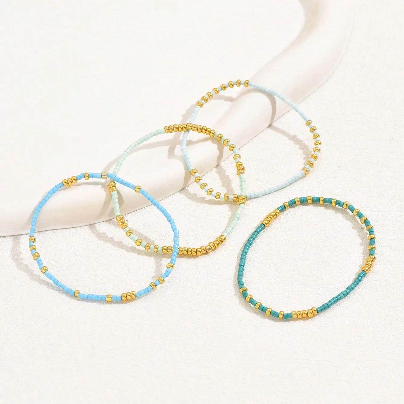 

Набор из 4 шт. браслетов-стретч из бисера цвета бирюзы в богемном стиле, с золотистыми стеклянными бусинами, эластичные, ручной работы, для девочек, для отпуска, с цирконом 16cm разноцветный