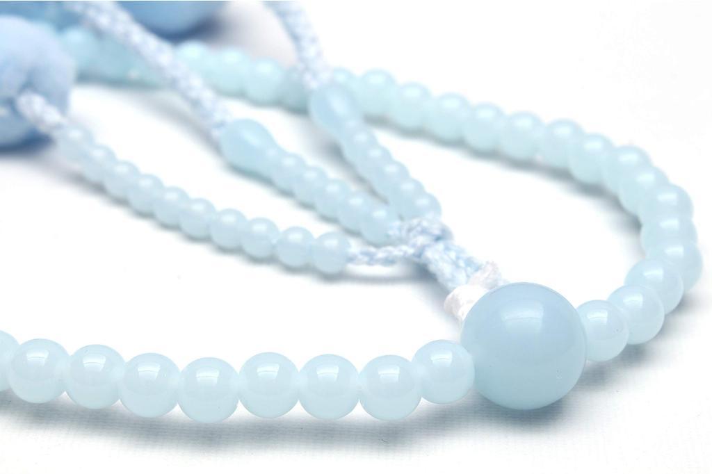 Japanese-made Soka Gakkai prayer beads set, perfect as a gift for new members. Includes a pink and cherry blossom design on the beads and a light blue