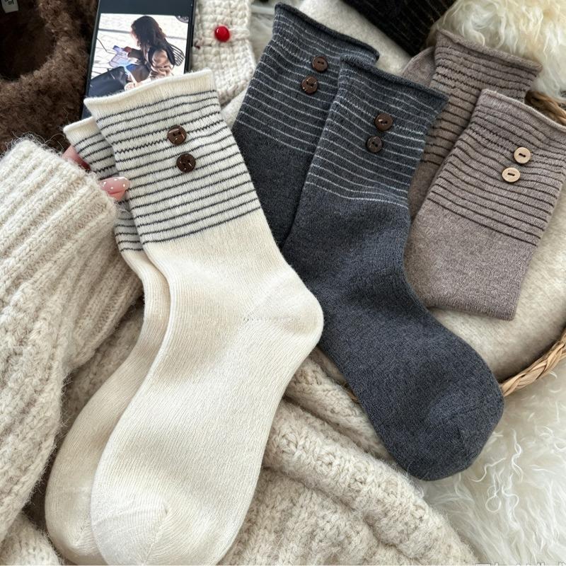 Winter Korean socks women's boneless splicing striped coconut buttons thermal storage heap socks women's socks wool socks