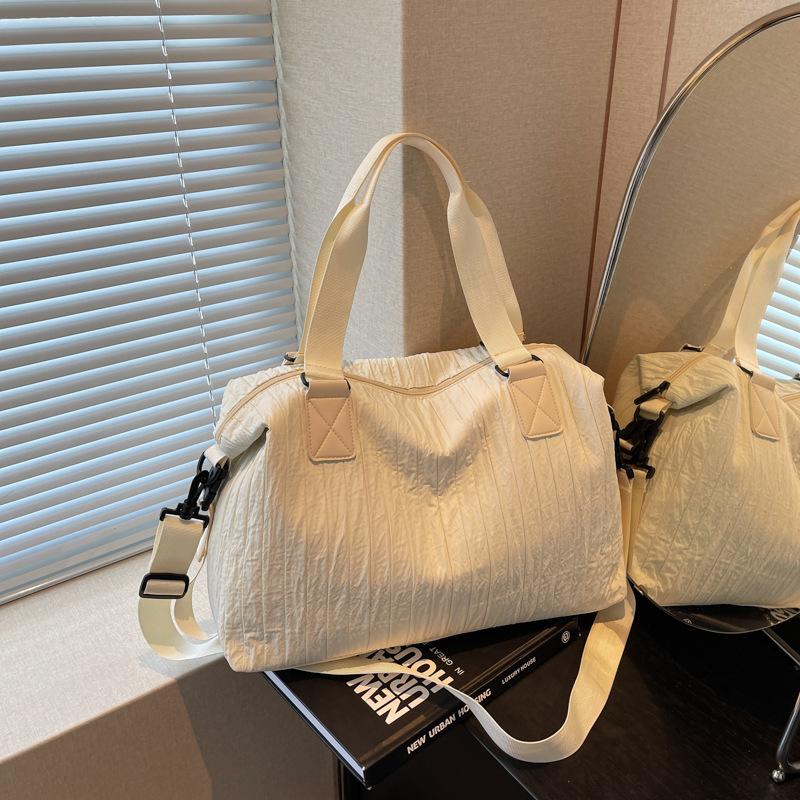 Niche large-capacity canvas bag women's new commuter messenger bag shopping class shoulder tote bag