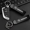 Bil Läder Bil Logotyp Metall Nyckelring Ring Hänge För Nissan X-trail Qashqai Note Juke Sentra Patrol Navara Micra Leaf Almera