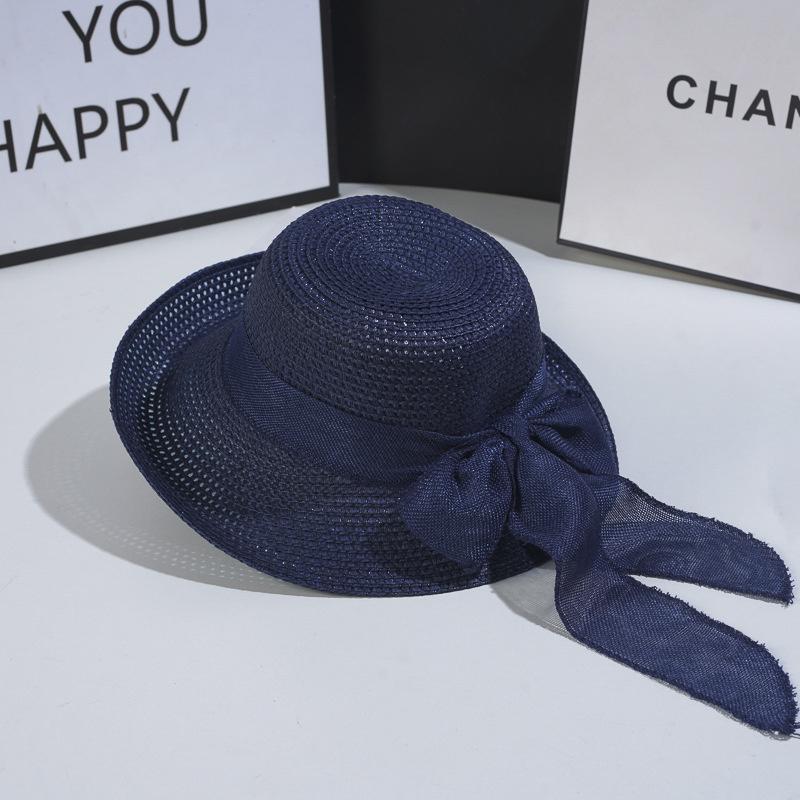 

Fashion Vintage Sun Hat with Bowknot - Foldable StrawFedora for Women -ldeal for Outdoor Travel AndBeach - Sunscreen Protection 56-58cm темно-синього кольору