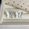 Natural High-arc Shell Butterfly Ear Clips Without Ear Piercings, High-end Niche Earrings, Fashionable and Exquisite Mosquito Coil Disc Earrings.