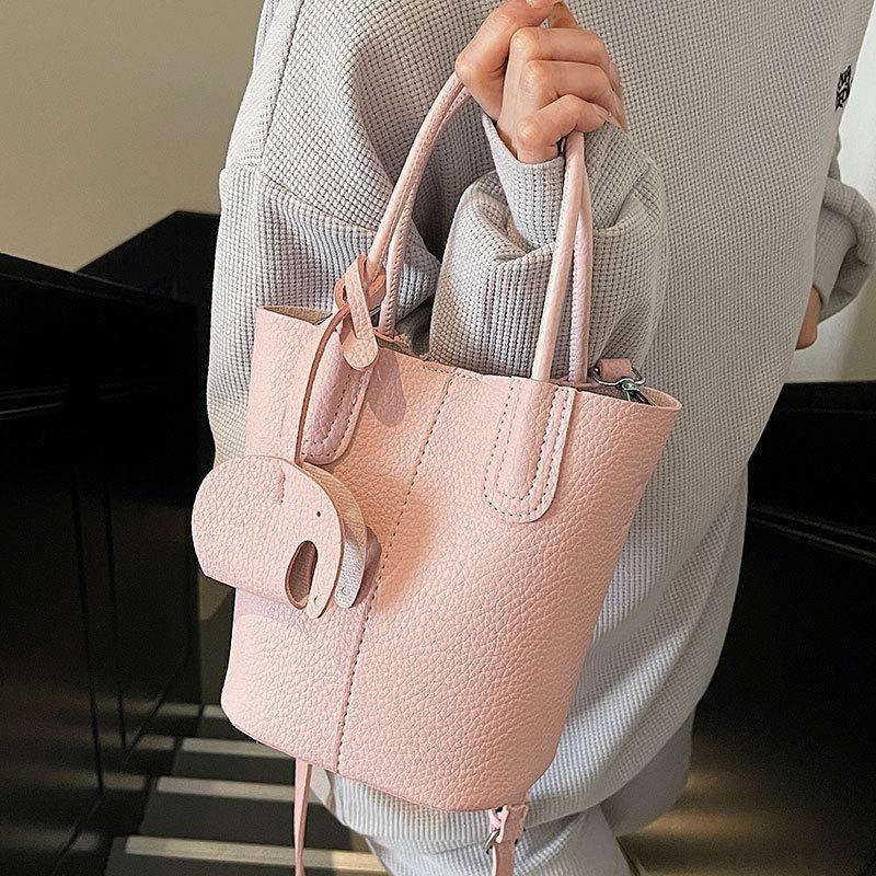 Popular Korean Simple Style Temperament Portable Bucket Bag Women's High-end Lychee Pattern Commuting Versatile Messenger Bag