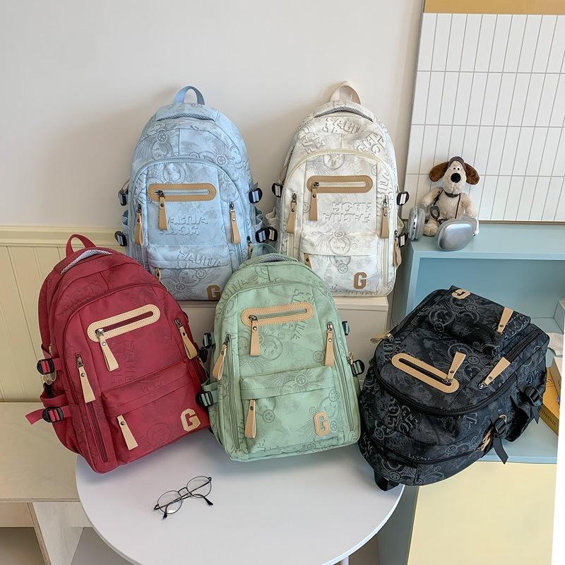 Schoolbag1011 New high school boys backpack large capacity trendy cool graffiti junior high school student schoolbag female campus computer backpack