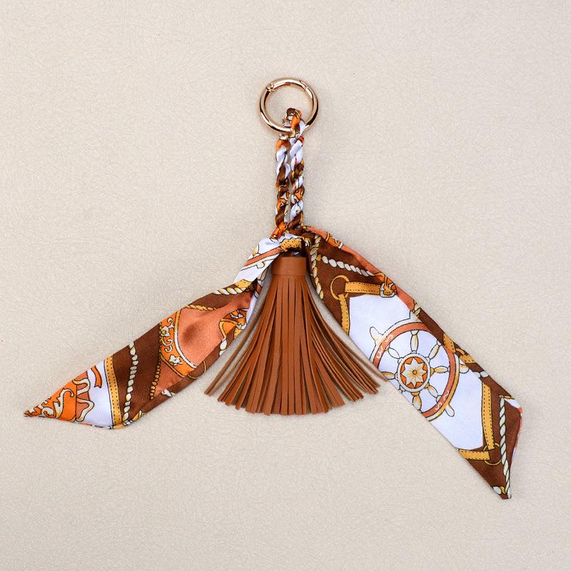 Korean Luxury Leather Bow & Tassel Charm Keychain