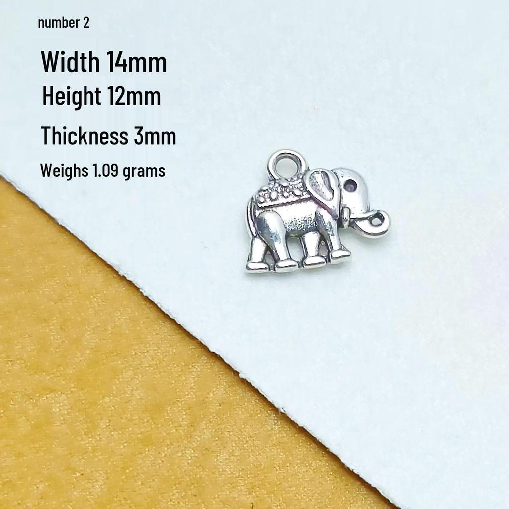 Tibetan Silver Ethnic Bracelet with Thai Elephant Pendant and Vintage Alloy Charms