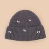 Autumn and winter cute bow simple knitted hat women warm sweet outdoor leisure pullover hat