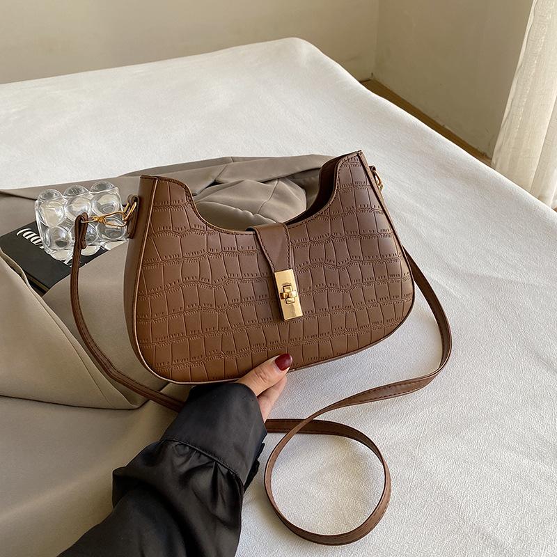 

Simple niche design bag 2024 summer new popular casual messenger bag simple fashion shoulder armpit bag коричневий