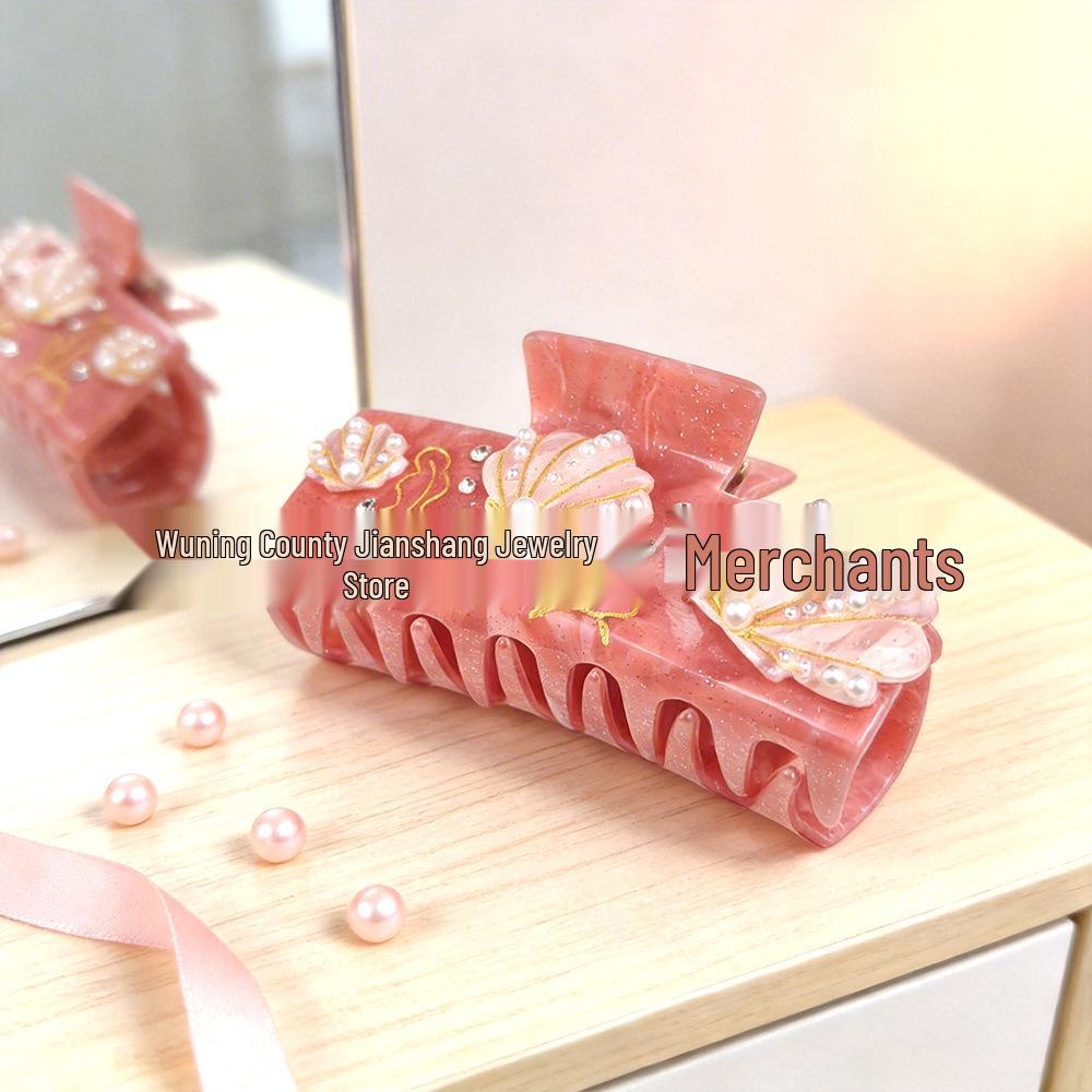 Elegancka spinka do włosów z cyrkoniami w kształcie rozgwiazdy i muszelkowa klamra do upięć