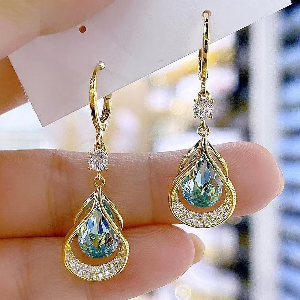 Korean-Style Elegant Rhinestone Ball Earrings - Versatile, Fashionable, and Ultra-Shiny Design.