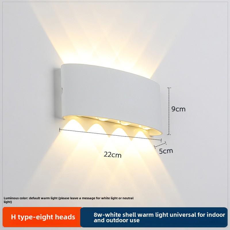 LED Outdoor Four-Leaf Clover Wall Light - Up and Down Beam Decoration for Garden and Exterior Walls.