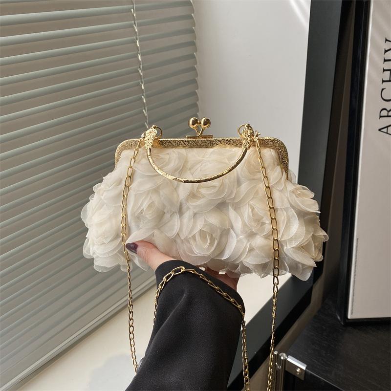 Summer new beautiful flowers light luxury sweet solid color dinner bag high sense portable shoulder messenger bag women