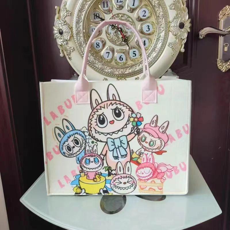 

Самая продаваемая мультяшная фетровая сумка-тоут La Bu Bu с очень большой вместимостью - Высококлассная подарочная и дорожная сумка