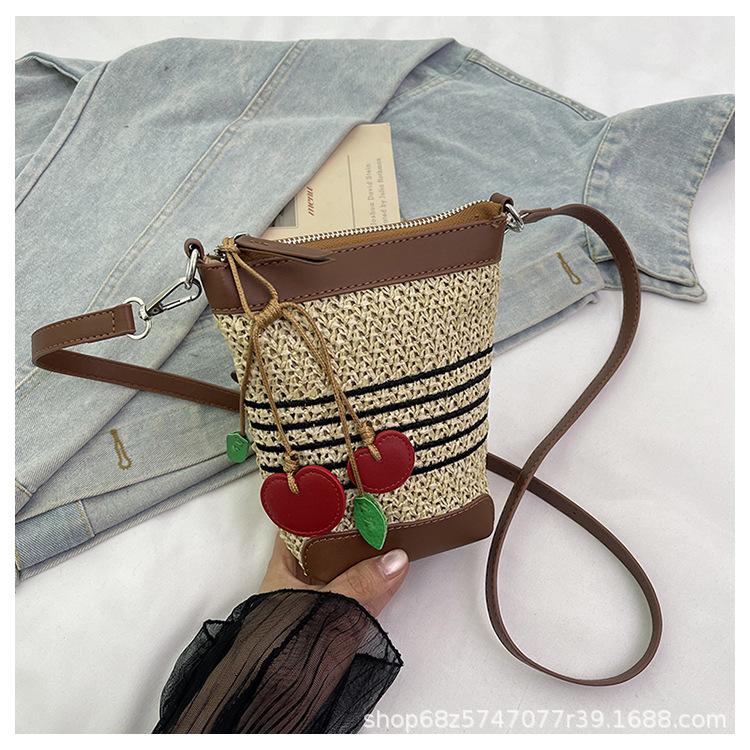 Трендовая модная сумка-ведро женская 2025 лето новая простая плетеная сумка на плечо нишевая высококлассная соломенная плетеная сумка-мессенджер