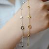 French Luxurious Hollow Clover Titanium Bracelet for Girls - New High-End Star Flower Design