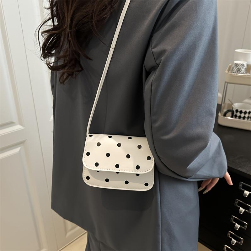 Stylish crossbody mini square bag, a high-end niche women's shoulder bag, the white polka dot design adds a fresh and youthful touch.