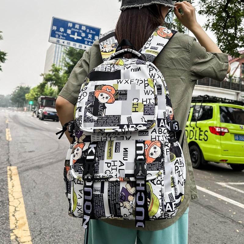 New fashion student schoolbag animation printing trend fashion backpack men and women large capacity simple graffiti backpack