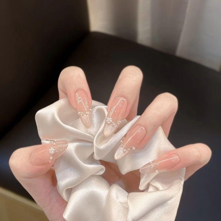 Pearlescent moonlight French cat eye wearing armor medium and long versatile high-end nude white ice through cat eye manicure bag xs