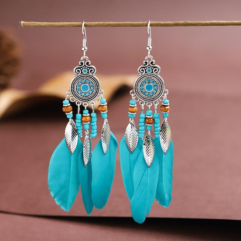 

Bohemian Long Round Drop Oil Feather Earrings for Women Ethnic Vintage Bead Metal Leaf Tassel Earring Pendientes Mujer Brincos павлин голубой
