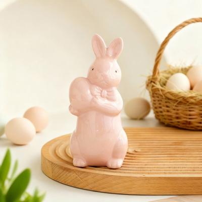 Yousheng Oster-Eierhaltendes Kaninchen-Figur Keramik Fliege Hase Statue Skulptur Frühling Oster-Feiertags-Party Dekoration Schmuck
