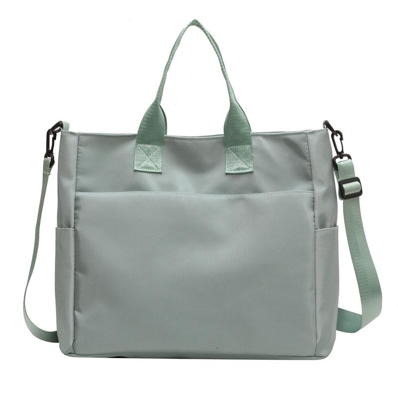

Niche portable tote bag 2025 new large-capacity lightweight commuter shoulder bag trendy student class messenger bag зелений